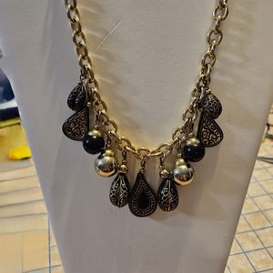 Vintage Gold Cable Chain Necklace with 11 gold and black charms.